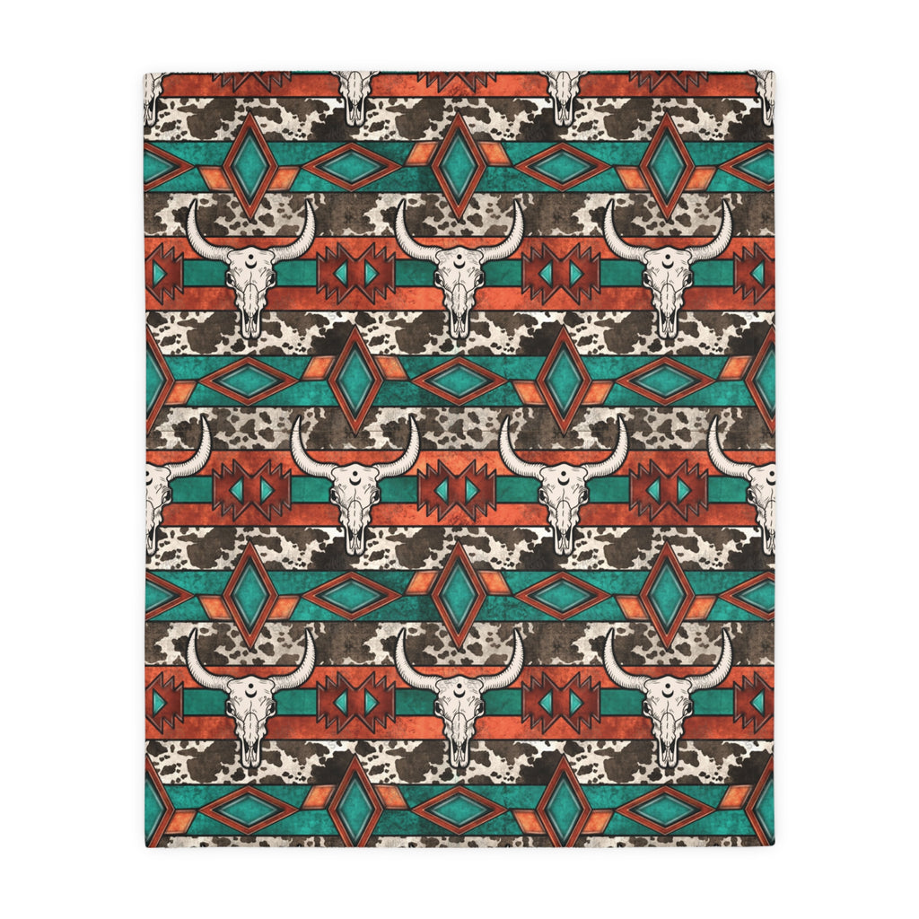 Patterned fabric with bull skull design and geometric shapes on a white background
