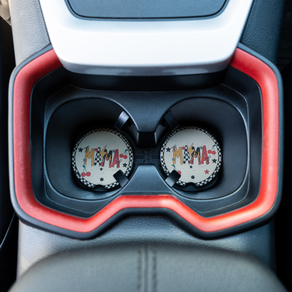 Checkered_Border__Cherries_MAMA_Retro_L_CarCoaster_CarInterior_Overhead_Mockup.png_16073362