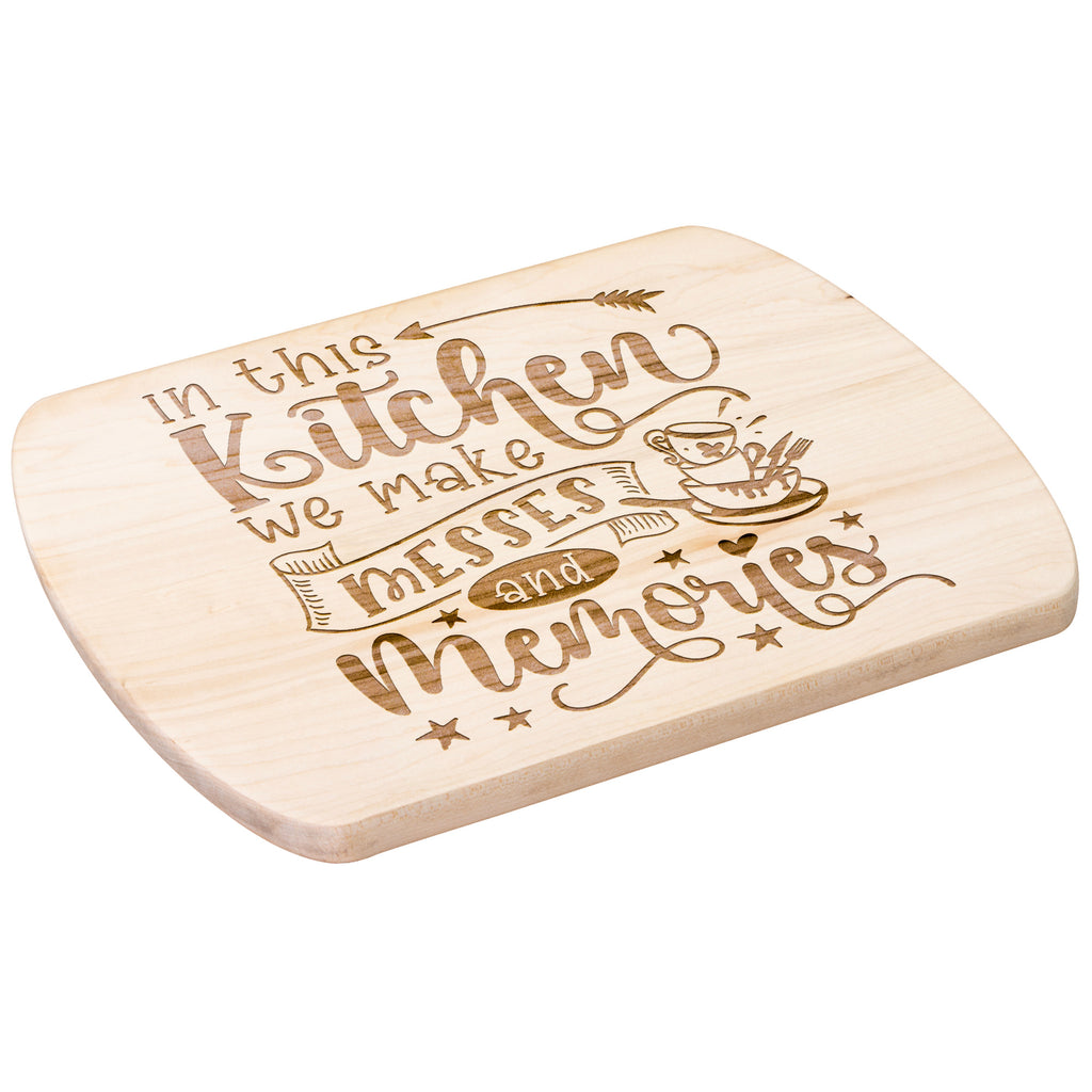 An oval maple wood cutting board with a quote about kitchen memories and a graphic design.