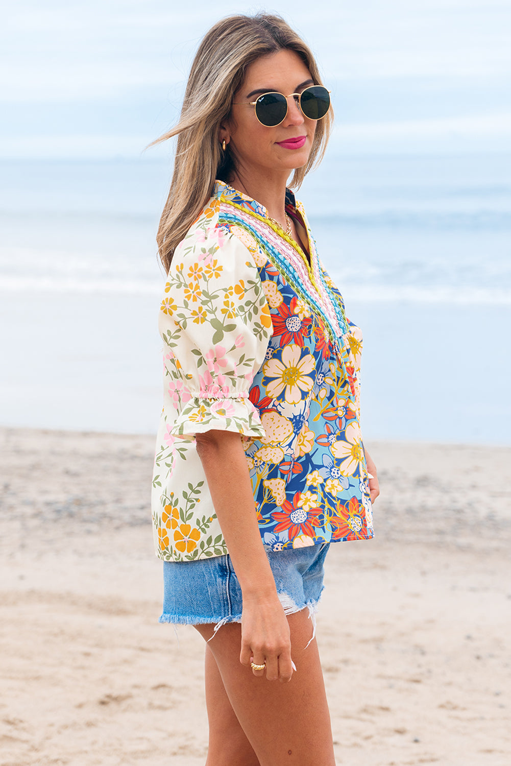 Close-up of the colorful boho patchwork floral print blouse with V-neckline