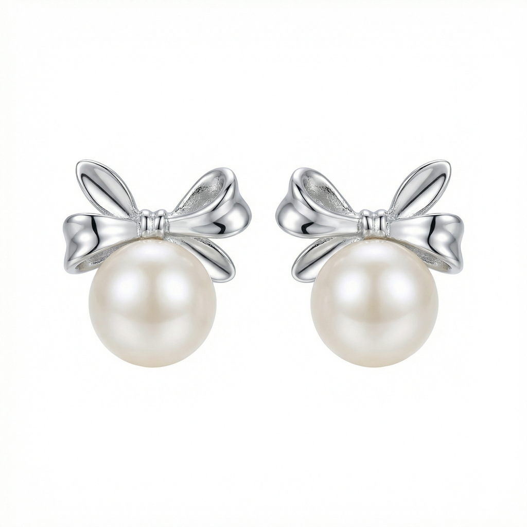 Sterling Silver Bow Knot Pearl Stud Earrings on White Background