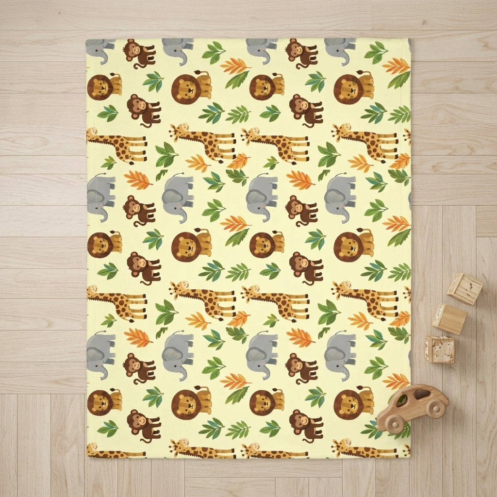 The nursery baby blanket laid out flat as a play mat next to wooden safari toys