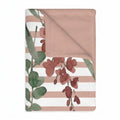 Studio main shot of folded Dusty Rose Garden Stripes baby blanket on seamless white background